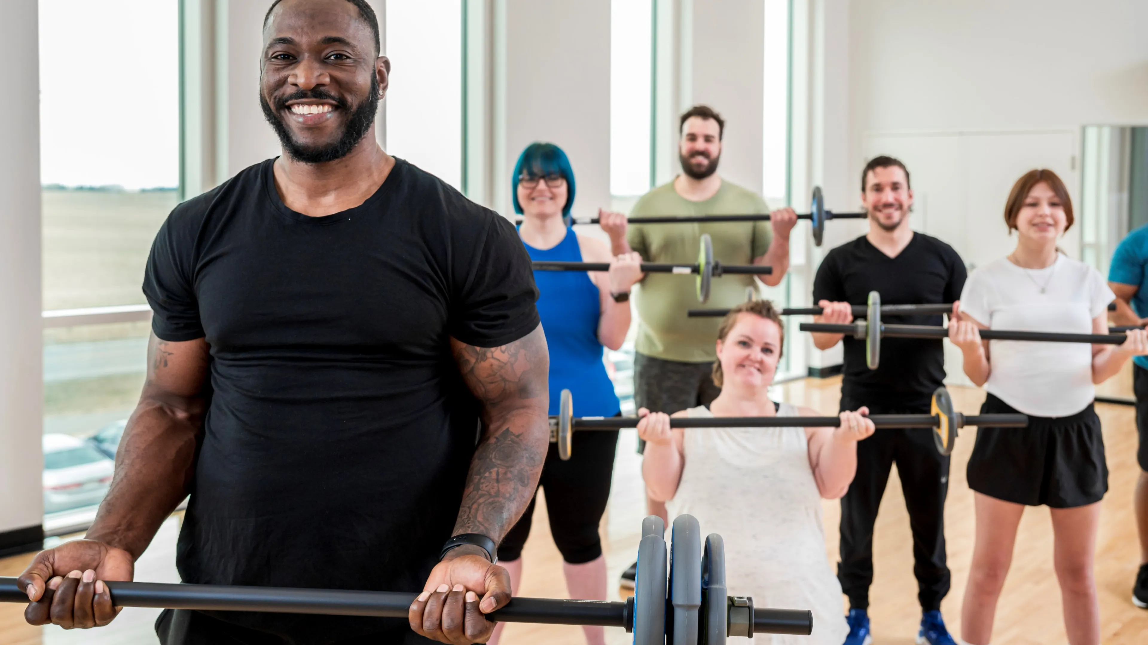 Group working out in group fitness class